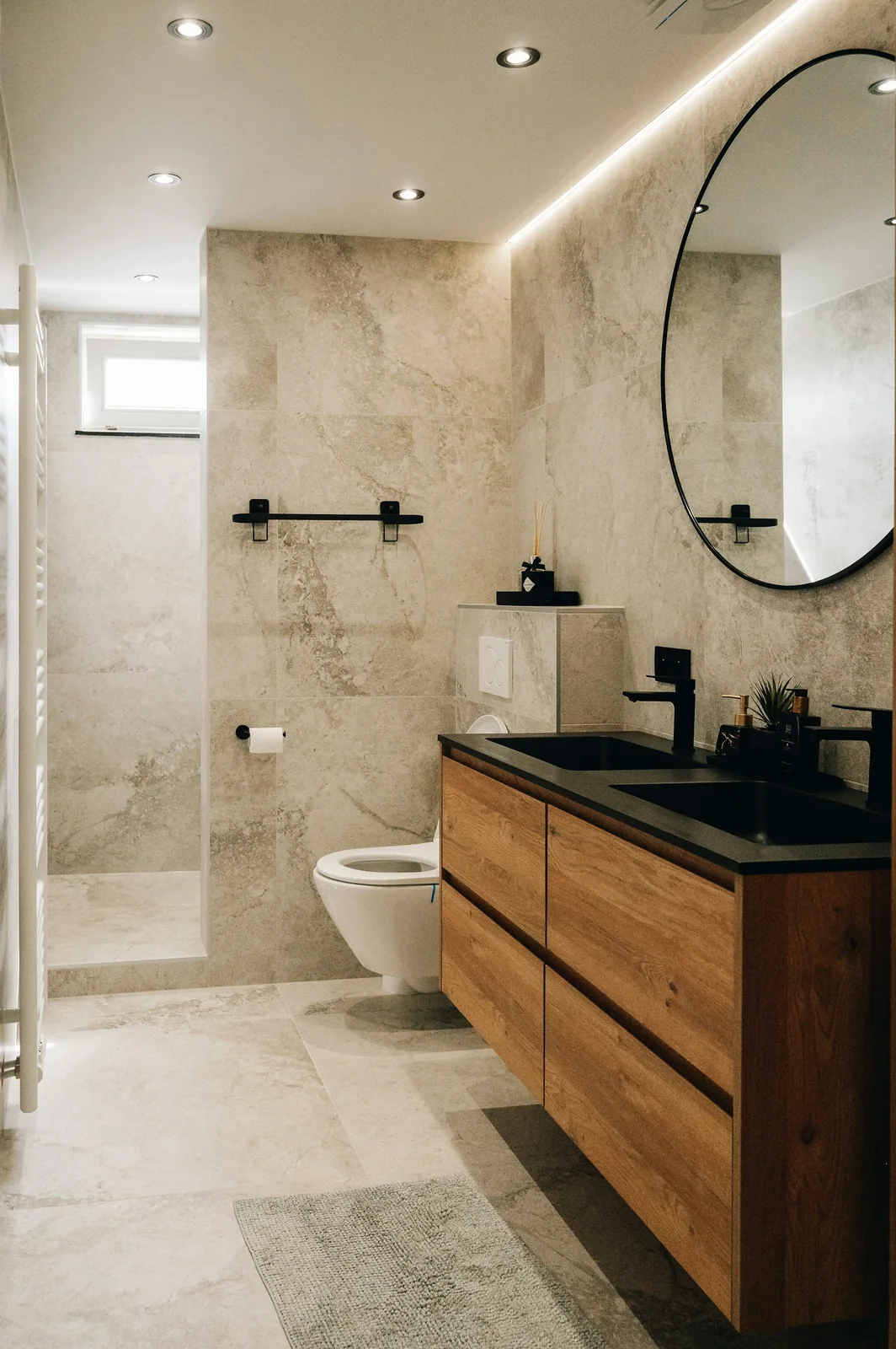 Mirror · Mirror mounted above a bathroom vanity — serjan midili, Unsplash License